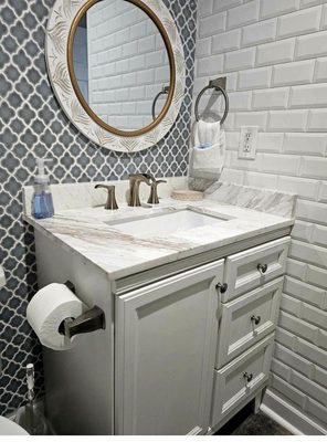 Clean bathroom vanity with marble countertop - photo verified turnover